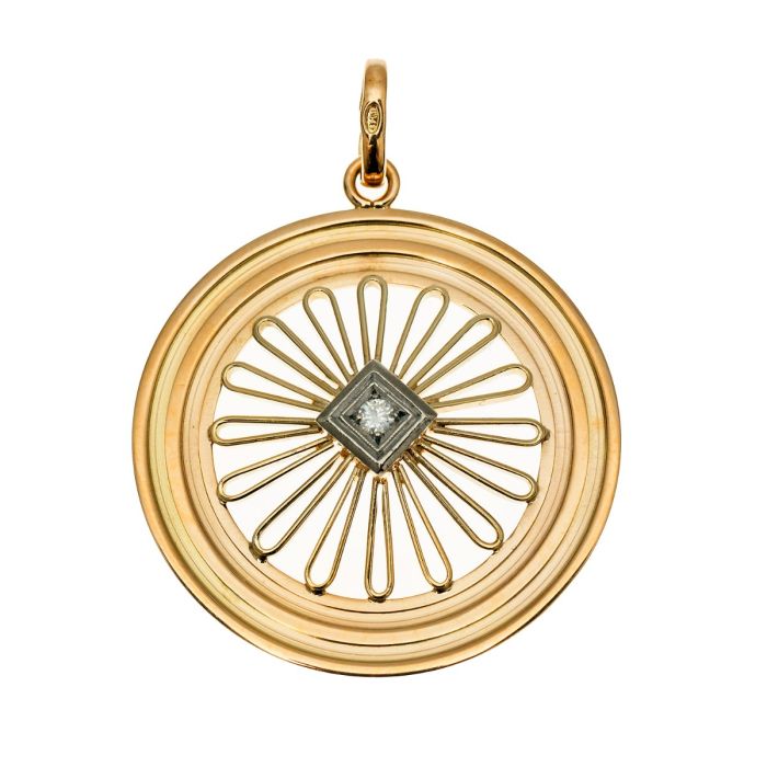 Rad-ähnlicher Anhänger des italienischen Schmuckherstellers "UNO AR" in 750er Gold. Er hat einen in Weißgold gefassten Altschliffbrillanten mittig