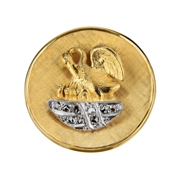 Brosche der Fa. Pelikan in 585er Gelbgold und Weißgold. Das Schaustück ist satiniert rund und dreidimensional mit einem im Nest sitzenden Pelikan verziert. 
Das Nest ist mit 9 Diamanten auf einem weißgoldenen Untergrund bestückt. 