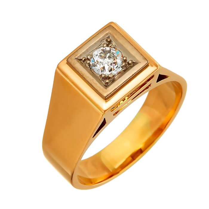 Ring in 18-karätigem Gold. Schauseitig ist in einer weißgoldenen Fassung ein Altschliffbrillant gesetzt.