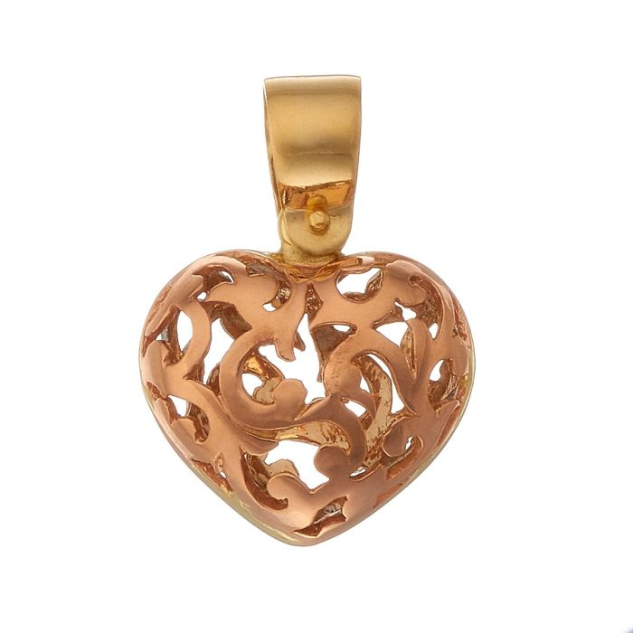 Anhänger in 18-karätigem Gold in Form eines Herzens. Die floral wirkenden Musterungen sind in Weißgold auf der einen und in Roségold auf der anderen Seite gearbeitet. Beidseitig tragbar.