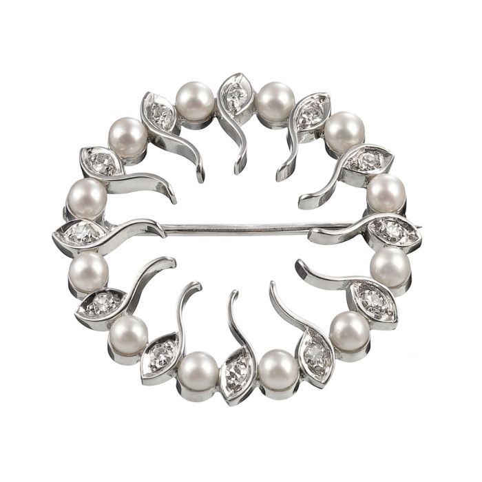 Brosche in runder Form aus 750er Weißgold mit 12 Perlen und 12 Diamanten