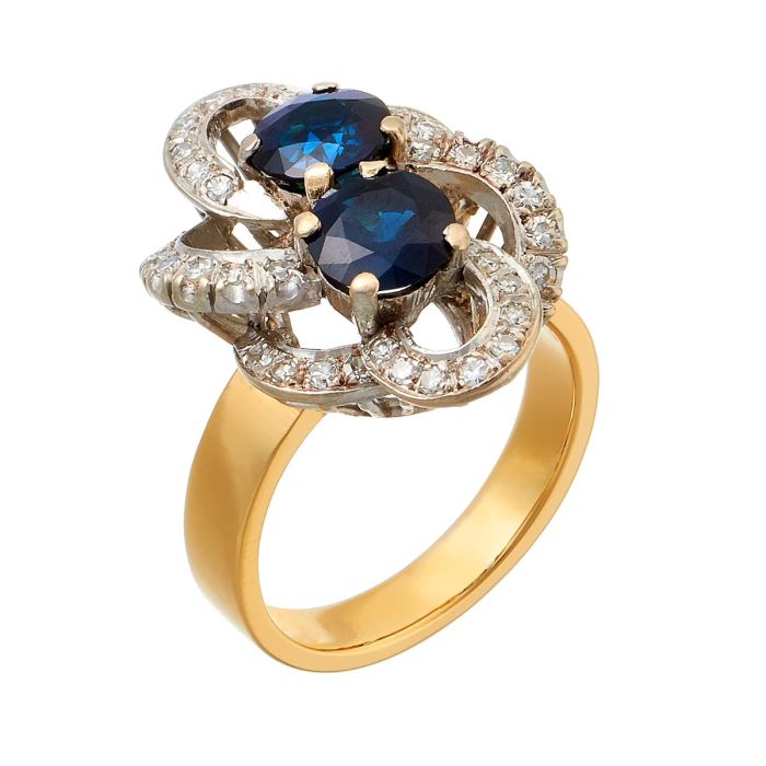 Cocktailring in 14-karätigem Gold mit floral wirkenden, geschwungenen und durchbrochenen Linien mit 2 Saphiren sowie 38 Diamanten.