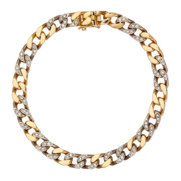 Bicolor-Armband aus 18-karätigem Gold. Die vierseitig geschliffene Flachpanzergliederung ist hochglanzpoliert. Die weißgoldenen Glieder sind mit jeweils 4 Diamanten versehen.