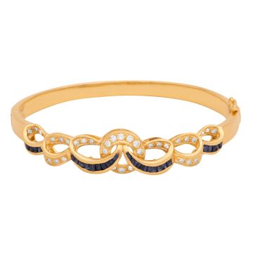 Exklusiver Armreif in 750er Gold mit Brillanten und Saphiren