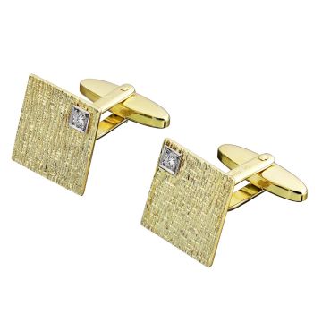 Paar quadratische Manschettenknöpfe aus 585er Gelbgold mit jeweils einem Brillanten