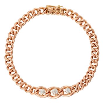 Armband in 14-karätigem Rotgold, bestehend aus Panzergliedern. Mittig sind 3 große Glieder eingesetzt, in denen jeweils 1 Brillant thront. 