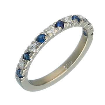 Damenring in 14-karätigem Weißgold. Der Bandring mit seiner schmalen Ringschiene fasst schauseitig 7 Saphire und 6 Brillanten.