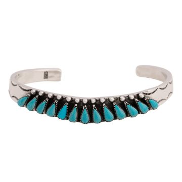 Aparte Armspange mit Türkisen