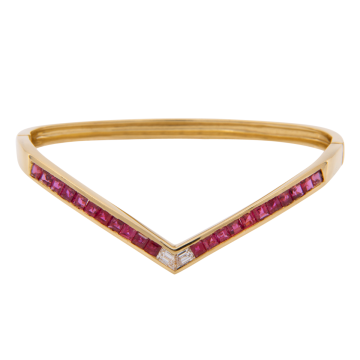 Außergewöhnlicher Armreif in 750er Gelbgold mit Rubinen und Diamanten