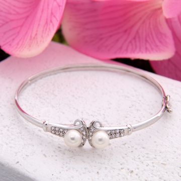 Eleganter Armreif mit Perlen und Zirkonia in 585er Weißgold