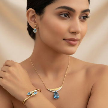 Set: Collier, Armreif und Ohrstecker mit Blautopasen