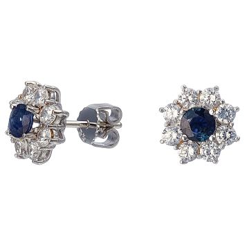Ohrstecker aus Weißgold. Die blütenartigen Schaustücke sind besetzt mit jeweils einem Saphir und 8 Zirkonia in Krappenfassung. 