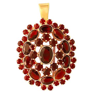 Brosche/Anhänger in 333er Gold mit Granatsteinen