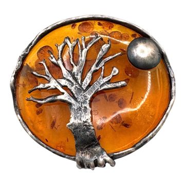 Silberne Brosche mit Bernstein